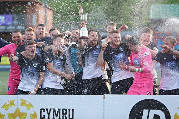 Haverfordwest County celebrate winning the European Play Off Final against Newtown